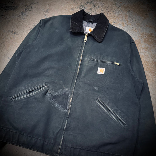 Vintage Carhartt J-001 Distressed and Repaired Faded Black Canvas Detroit Jacket