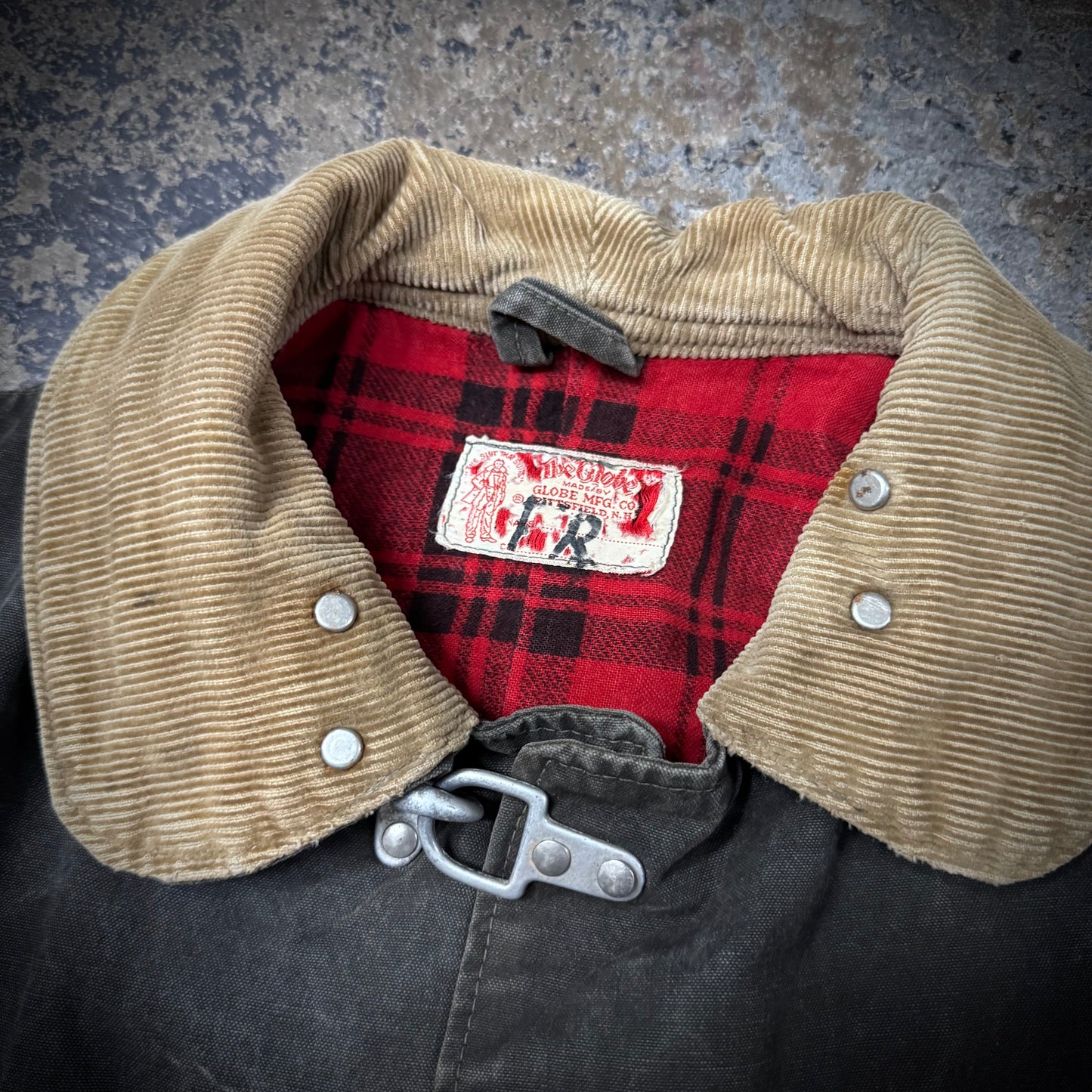 Vintage 1940s Faded Black Distressed and Repaired Fireman’s Clasp Canvas Jacket