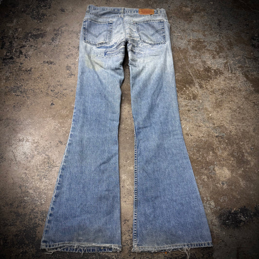 Vintage 90s/00s Distressed and Repaired Levi’s Bell Bottom Low Rise Men’s Jeans