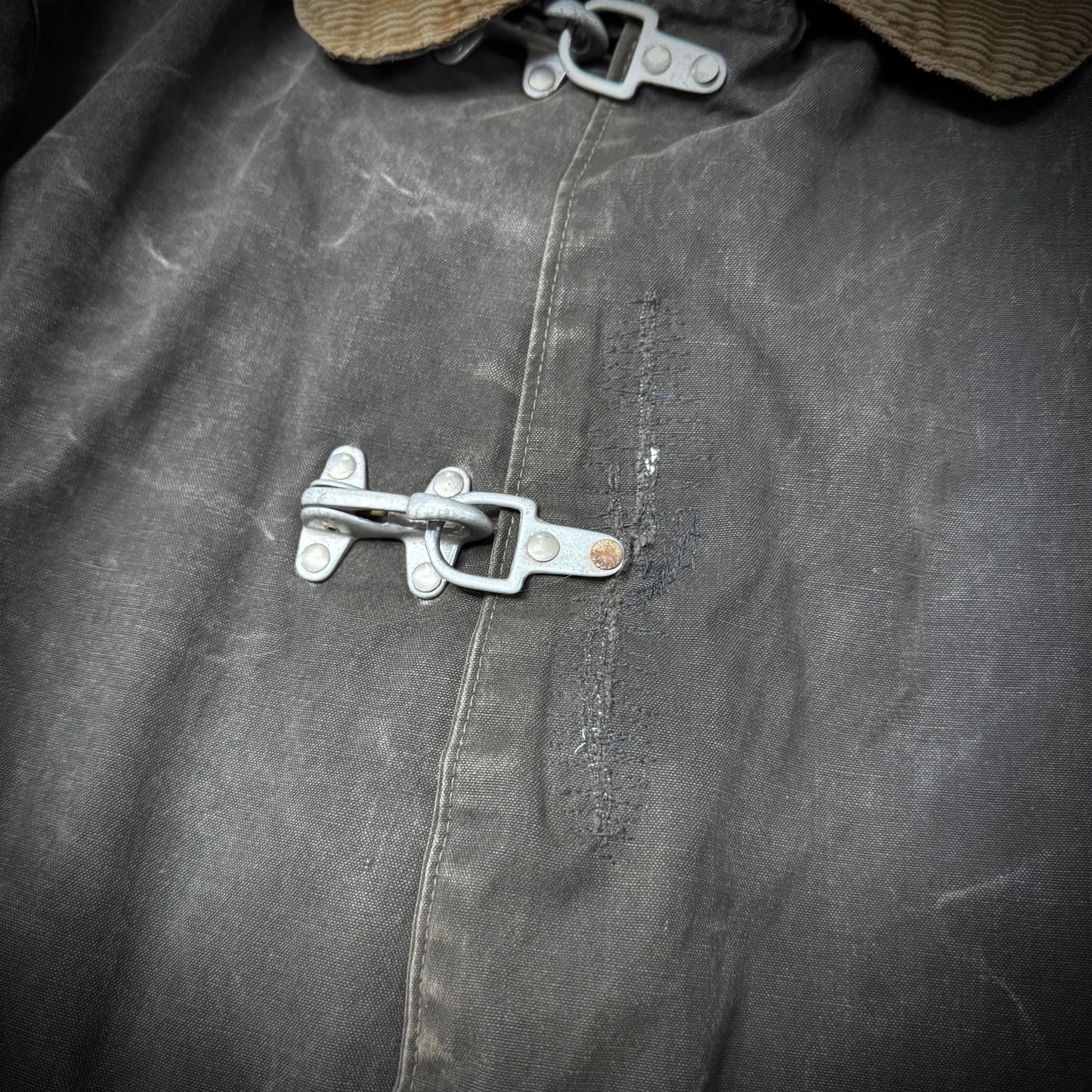 Vintage 1940s Faded Black Distressed and Repaired Fireman’s Clasp Canvas Jacket