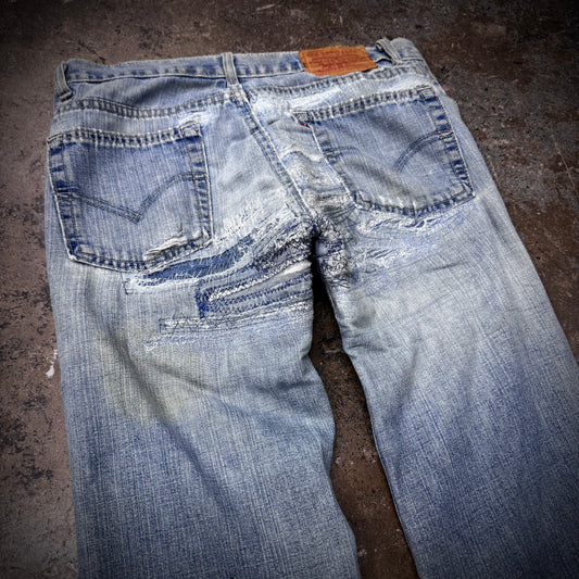 Vintage 90s/00s Distressed and Repaired Levi’s Bell Bottom Low Rise Men’s Jeans