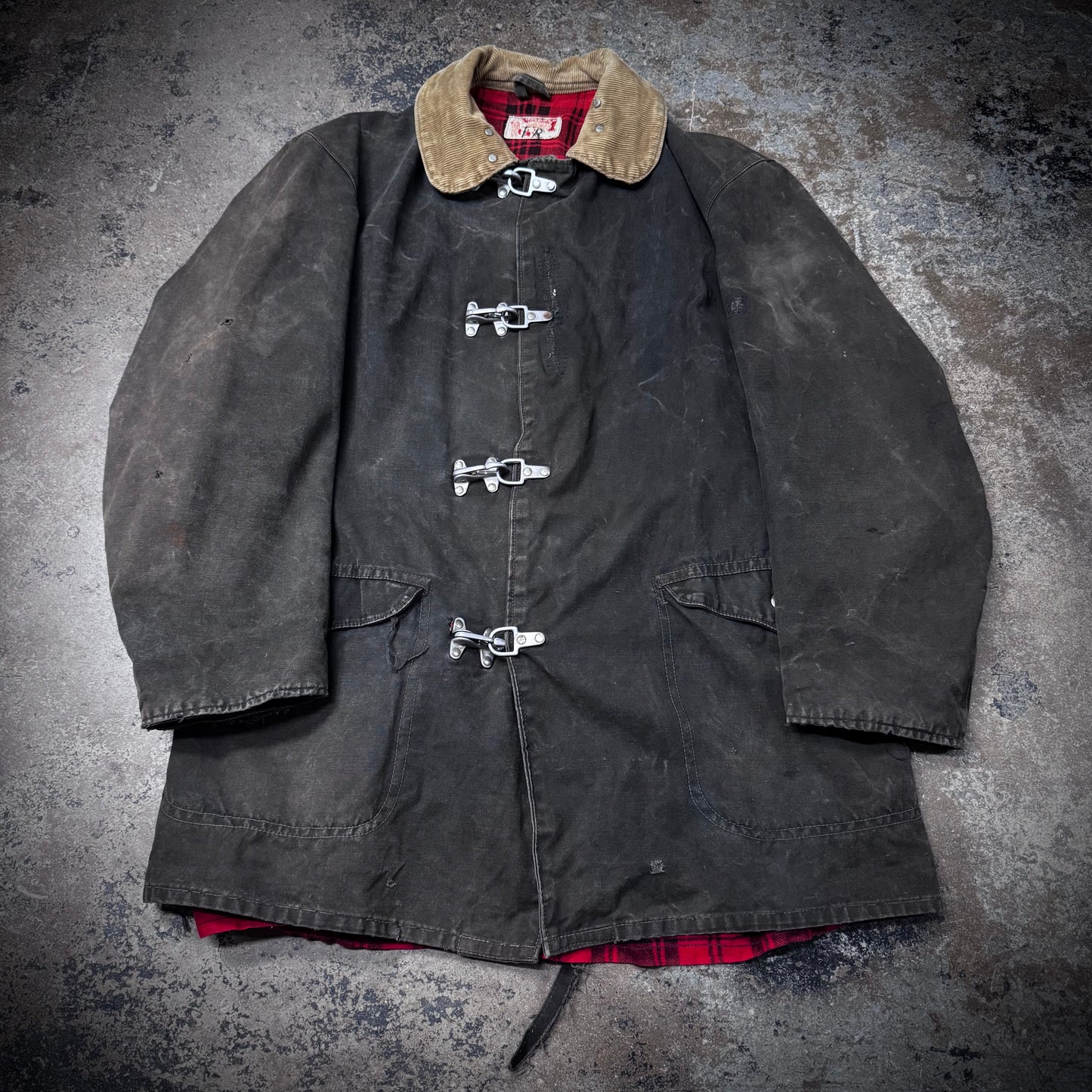 Vintage 1940s Faded Black Distressed and Repaired Fireman’s Clasp Canvas Jacket