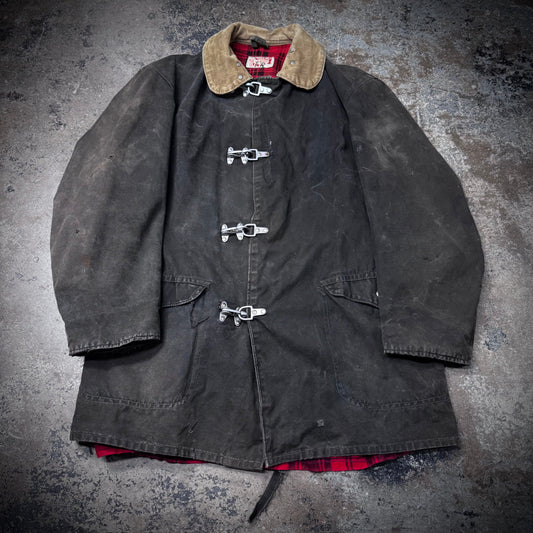 Vintage 1940s Faded Black Distressed and Repaired Fireman’s Clasp Canvas Jacket